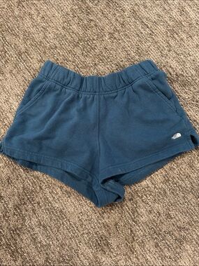 The North Face women’s blue Shorts •